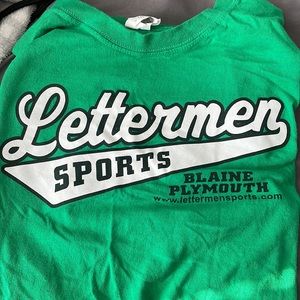 Letterman shirt color green and it’s a large